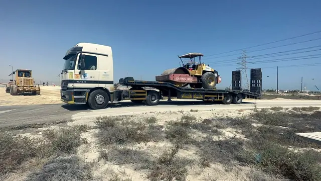 Lowbed moving plant to site